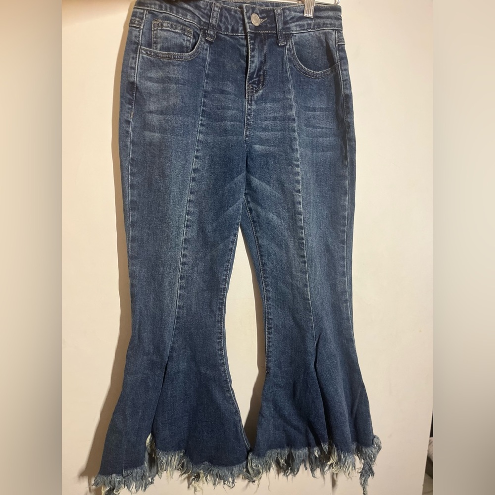 Women’s cropped bell bottom flared and frayed jeans